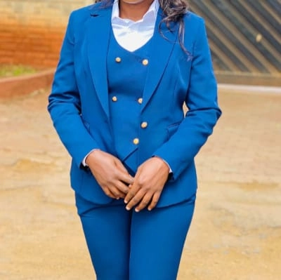 professional portrait of a woman wearing a royal blue suit  — 2