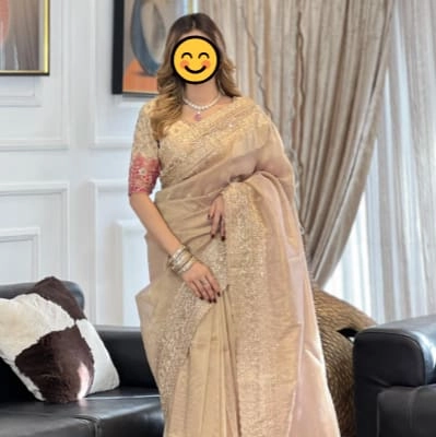 Beautiful champagne or gold-colored saree