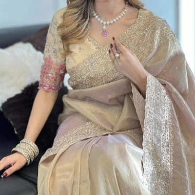 Beautiful champagne or gold-colored saree — 2