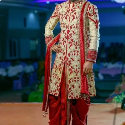 Traditional Indian groom’s sherwani outfit.