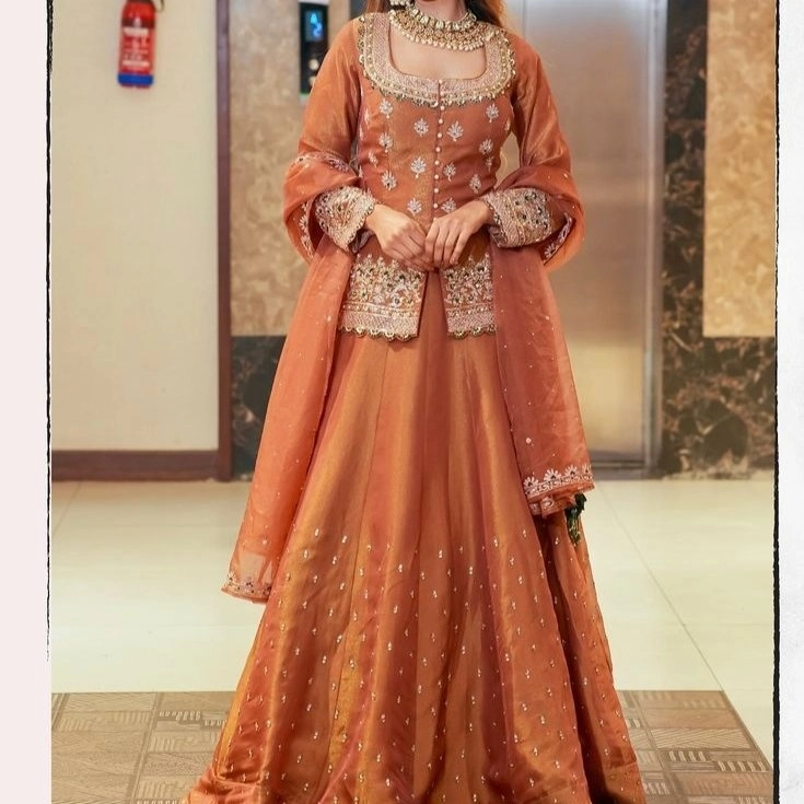 beautiful peplum-style short kurta with heavy chaniya