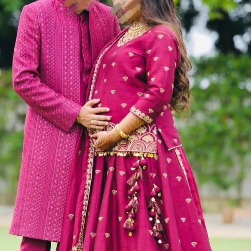 couple dressed in matching traditional Indian Were — 2