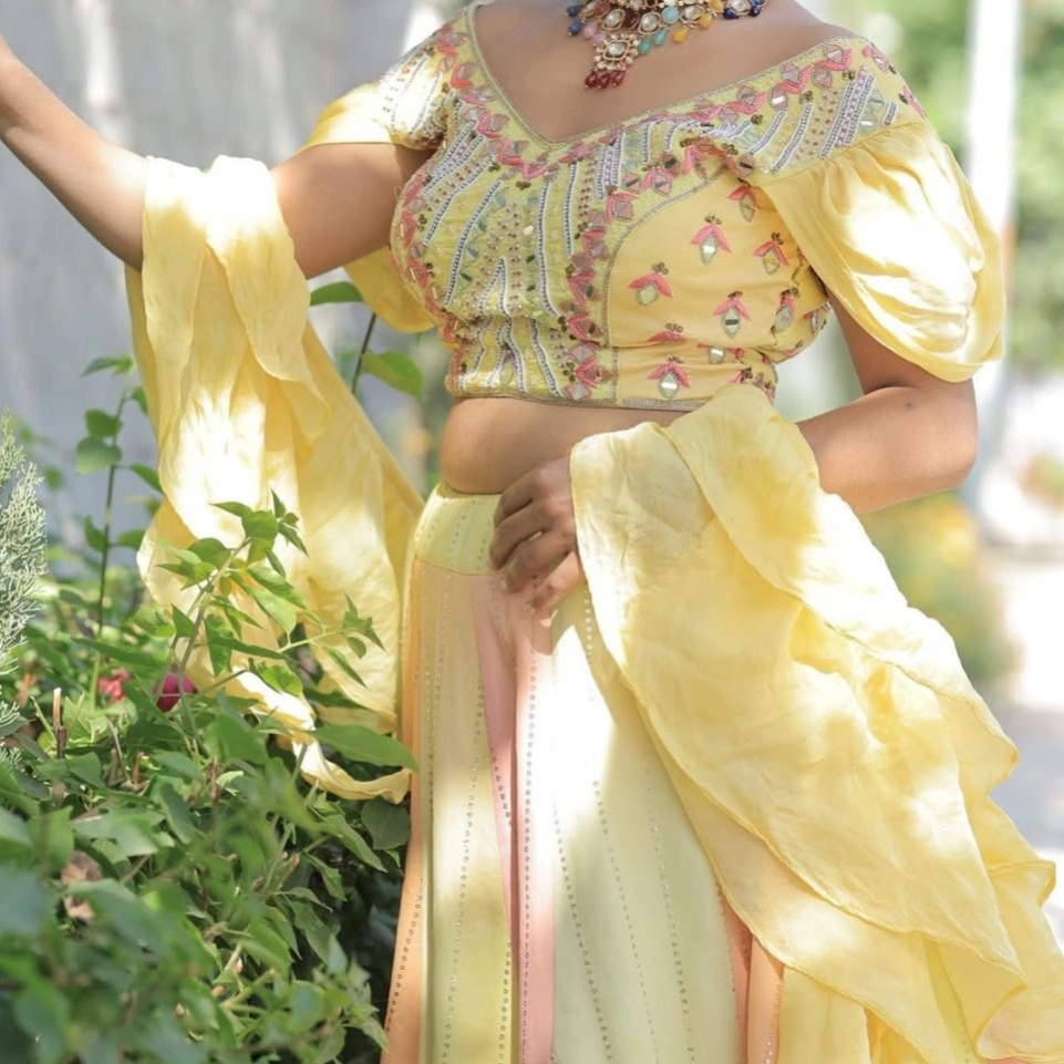 pastel yellow and peach designer lehenga — 2
