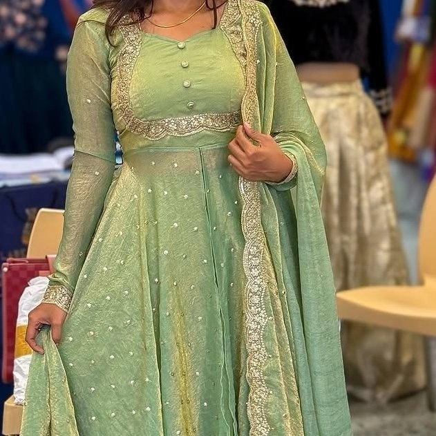 dobble layar pista green anarkali gown