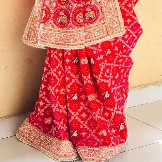 red colour heavy worked saree — 2